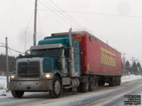 Ex-Thibodeau trailer used for wood shaving transport